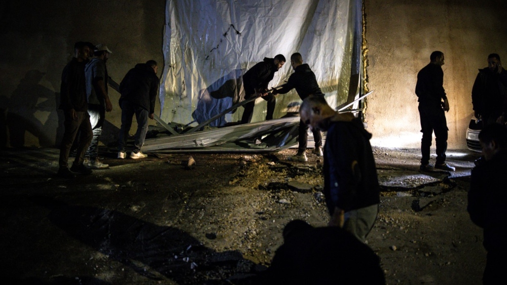 Israeli forces shoot dead two Palestinians apparently surrendering in West Bank